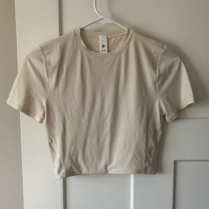 Brand new lululemon wundermost cropped tee - cream color